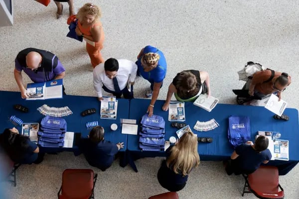 Job seekers attend a careers fair in Sunrise, Florida, US, on June 26.
