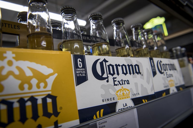 Bottles of Constellation Brands Inc. Corona beer sit on display for sale inside a BevMo Holdings LLC store in Walnut Creek, California, U.S., on Wednesday, Jan. 3, 2018. Constellation Brands Inc. is scheduled to release earnings figures on January 5. Photographer: David Paul Morris/Bloomberg