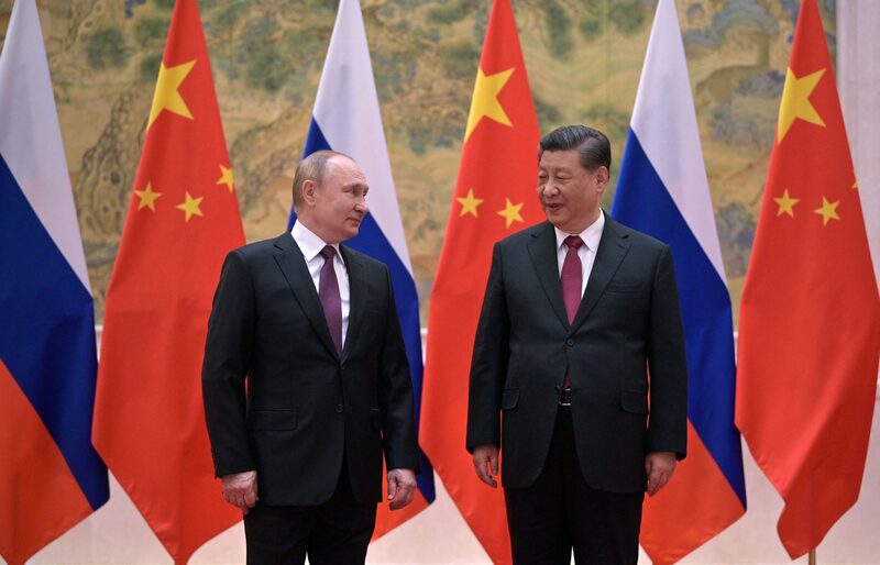 Russian President Vladimir Putin (L) and Chinese President Xi Jinping pose during their meeting in Beijing, on February 4, 2022. Photographer: Alexei Druzhinin/Sputnik/AFP/Getty Images