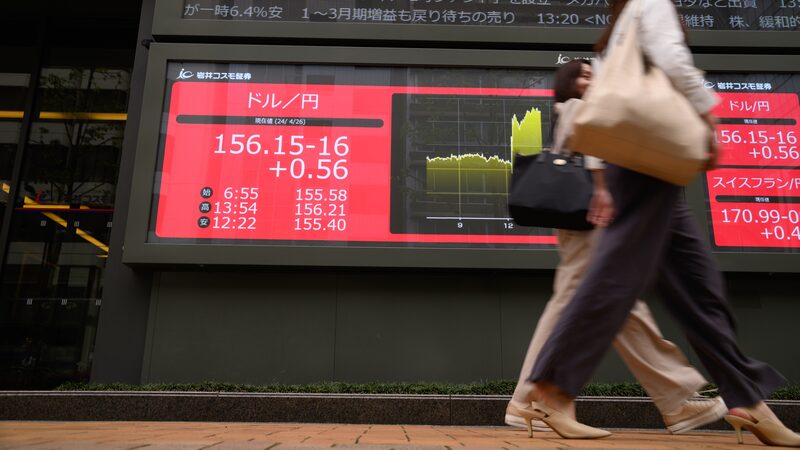 The rate of the US dollar against the yen displayed on an electronic stock board outside a securities firm in Tokyo, Japan, on Friday, April 26, 2024. The Bank of Japan held its interest rate settings steady and simplified its language on bond-buying at a two-day meeting that took place after the yen hit a fresh 34-year low this week. Photographer: Akio Kon/Bloomberg