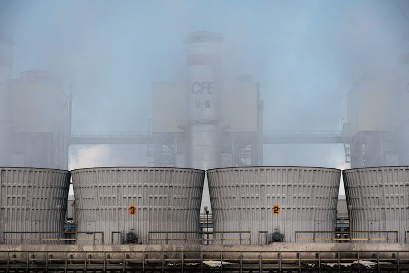 Cooling towers at the CFE's power-generation plant in Acolman, Mexico state. Photographer: Luis Antonio Rojas/Bloomberg